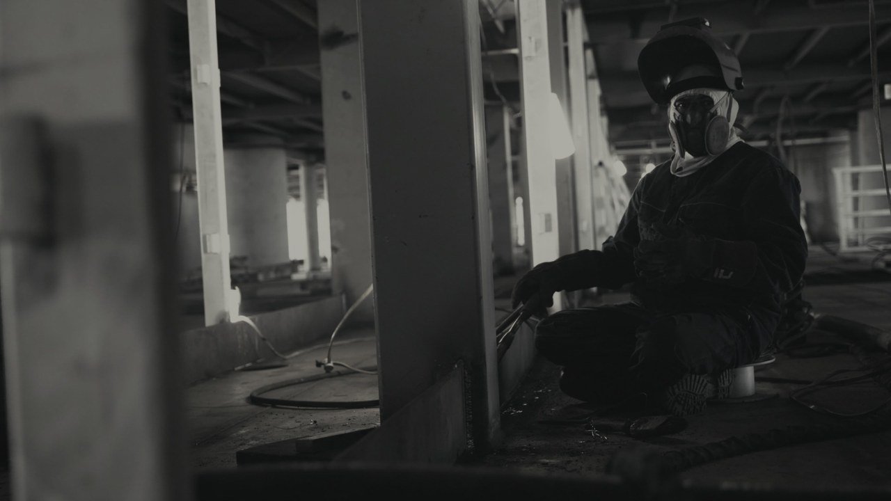 A shipyard worker inside a vessel